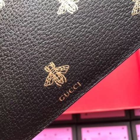 gucci bee star leather pouch